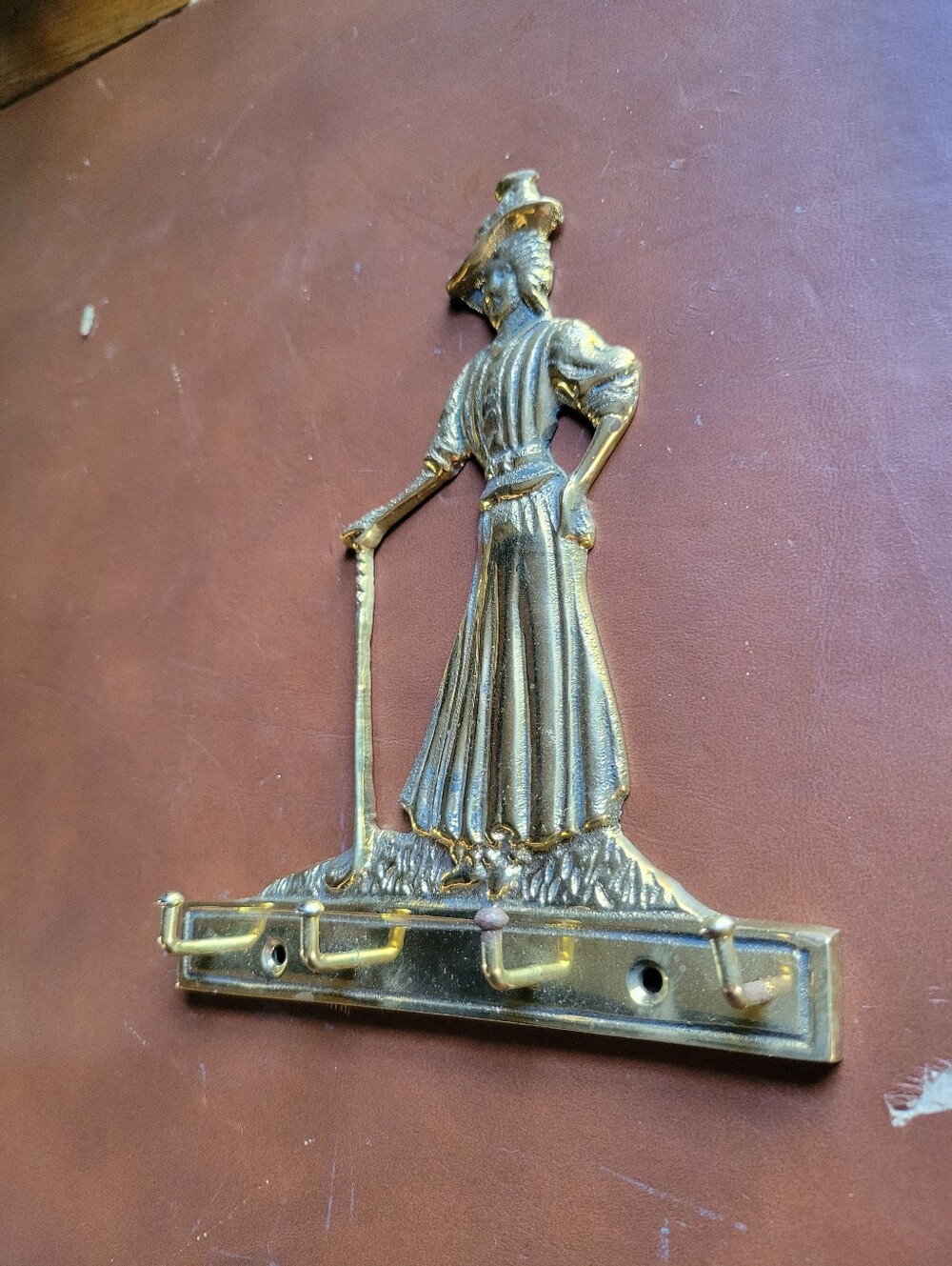 brass key rack holder golf Victorian woman female golfer